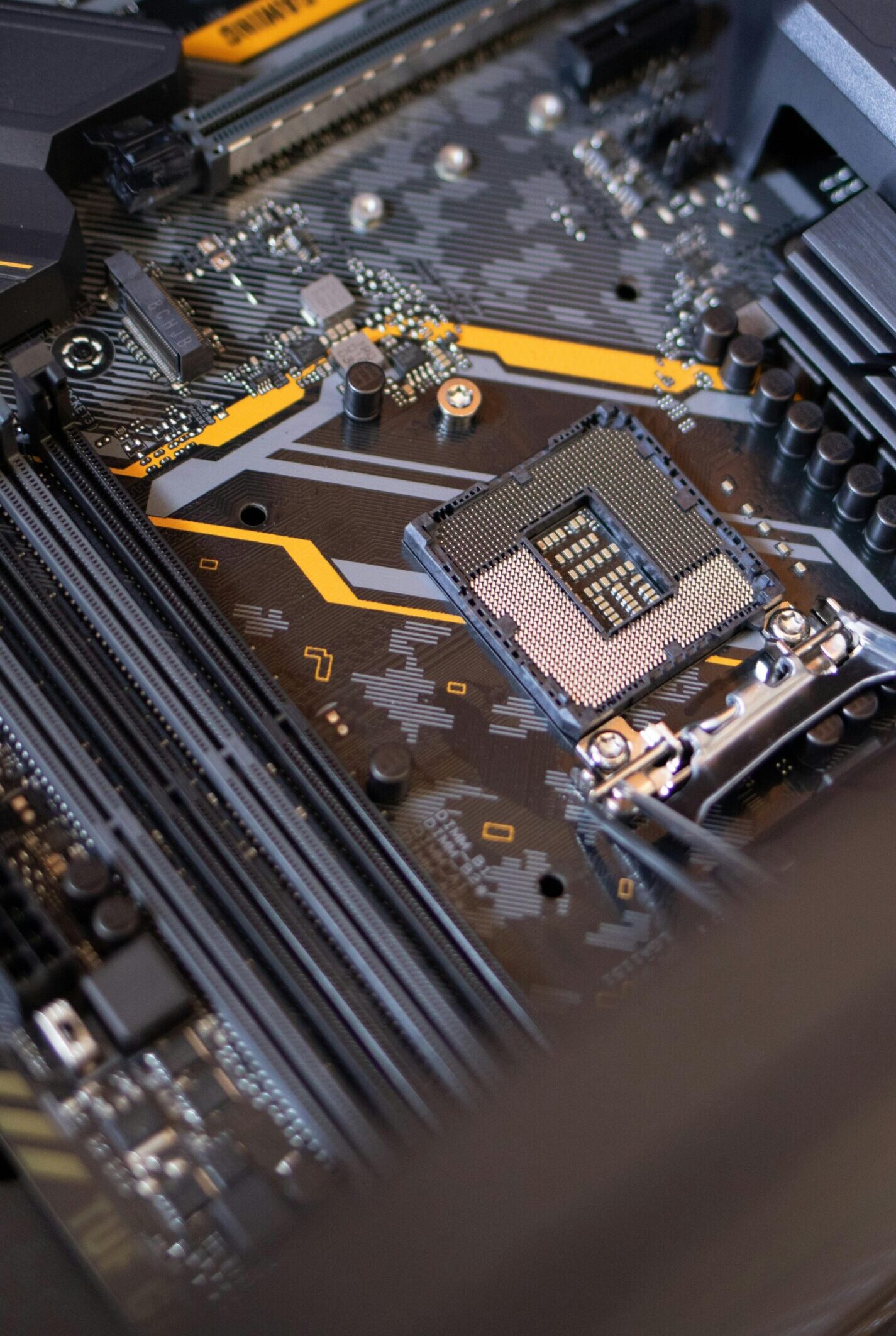 Detailed view of a computer motherboard highlighting electronic components and technology connections.
